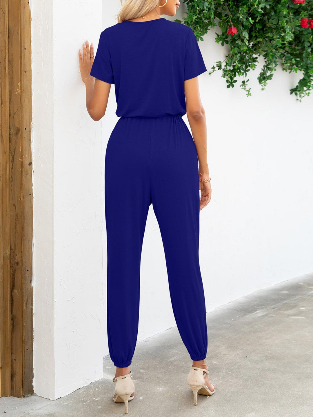 Kvinders Jumpsuit med Korte Ærmer V-Hals og Lommer 8