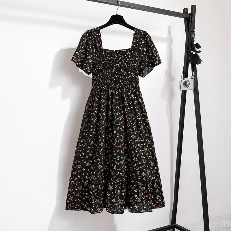 Midikjole i blomstret chiffon til kvinder