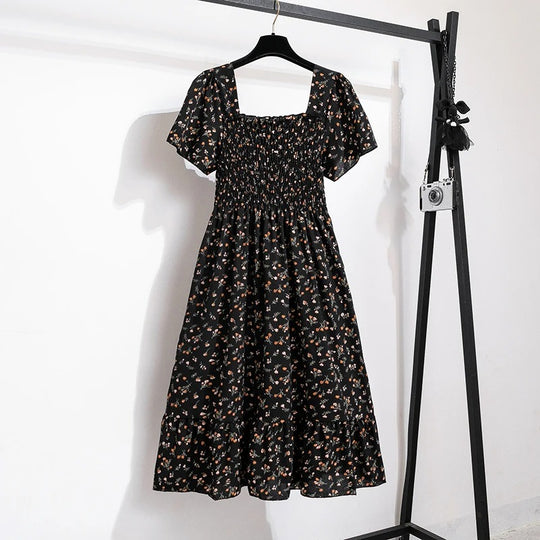 Midikjole i blomstret chiffon til kvinder